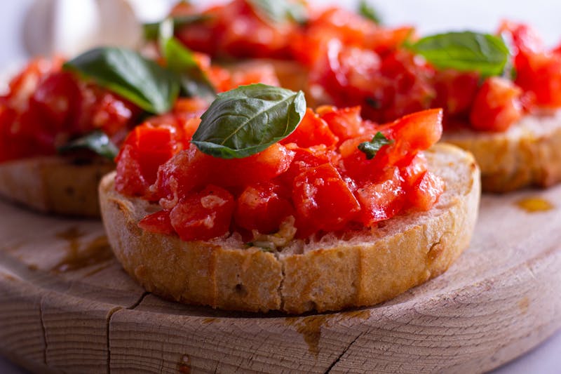 Bruschetta starter with roasted tomatoes and sourdough