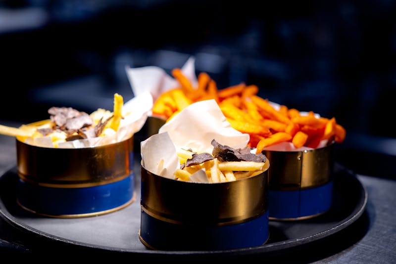 Truffle Parmesan Fries side dish with fresh herbs