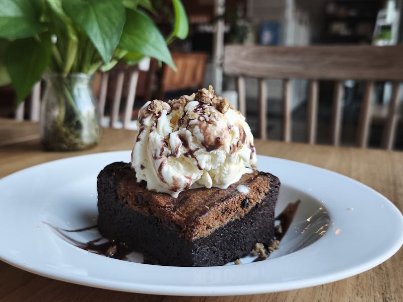 Warm Chocolate Brownie dessert with vanilla ice cream