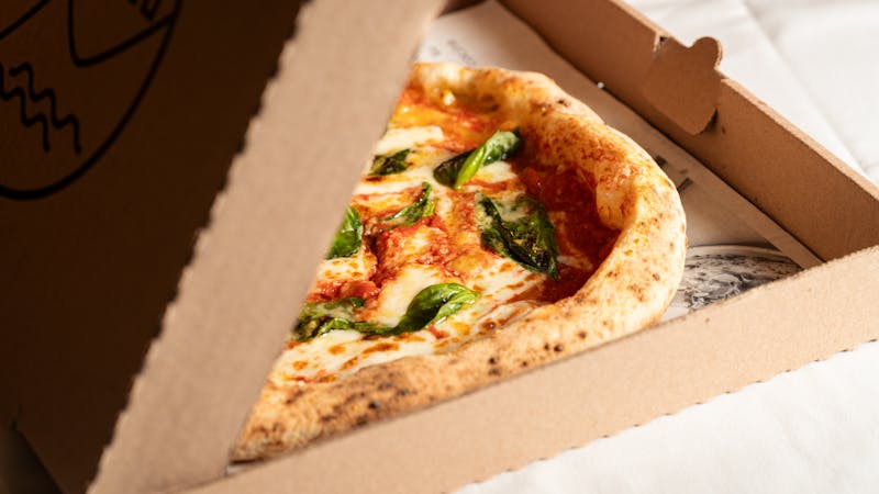 Apache Pizza stone-baked pizza ready for delivery