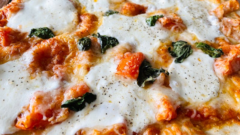 Apache Pizza classic Margherita with fresh basil and mozzarella