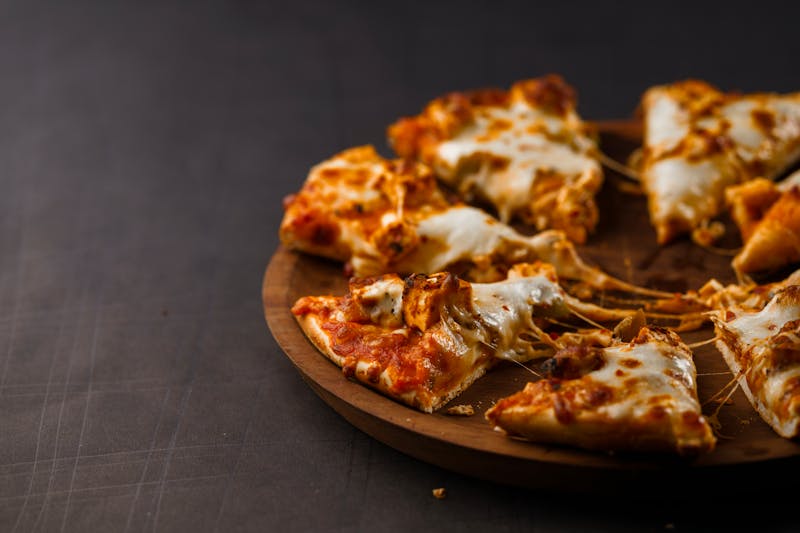 Four Cheese pizza with premium Italian cheeses at Apache Pizza